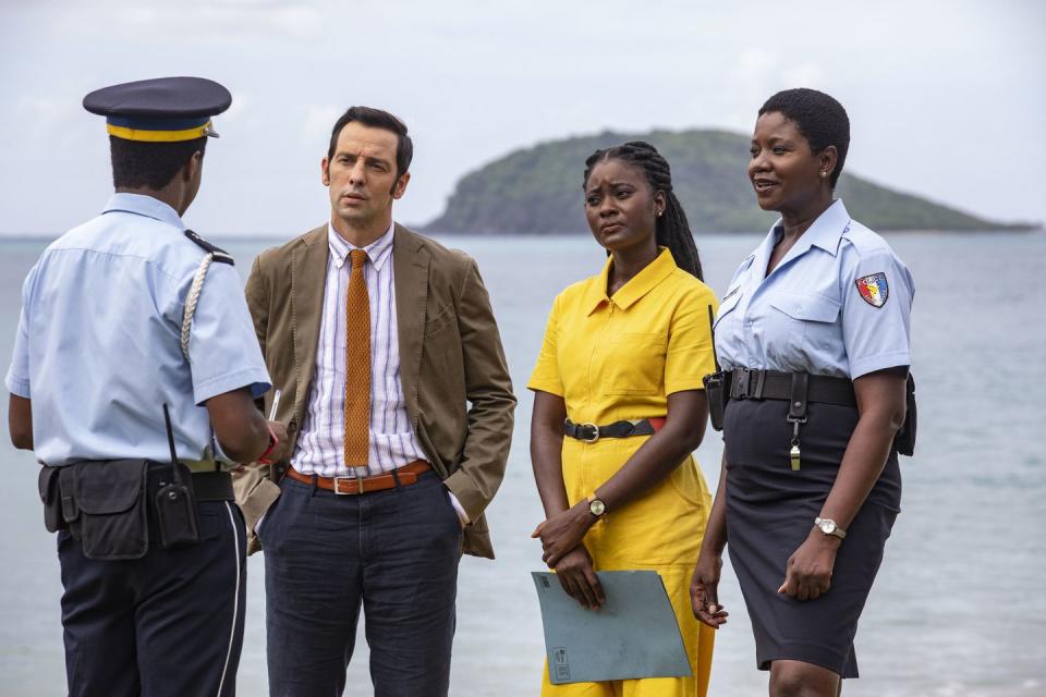 death in paradise,l r marlon pryce tahj miles, di neville parker ralf little, naomi thomas shantol jackson and darlene curtis ginny