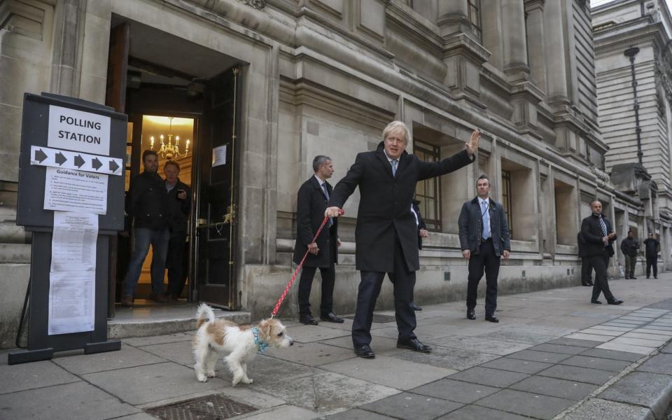 Boris Johnson with his pet dog Dilyn - BLOOMBERG