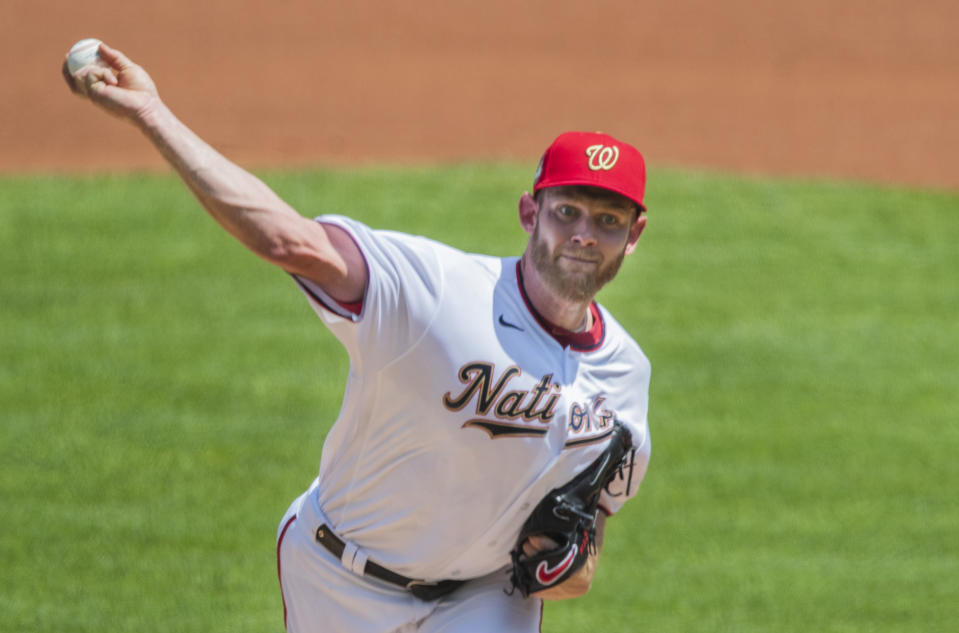 Washington Nationals starting pitcher Stephen Strasburg throws during the first inning of a baseball game against the Baltimore Orioles in Washington, Sunday, Aug. 9, 2020. (AP Photo/Manuel Balce Ceneta)