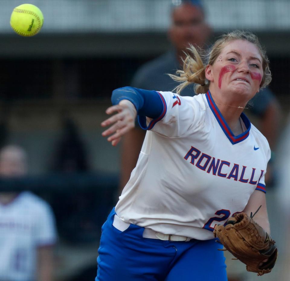 Roncalli Royals Carley Keller (20) throws the ball to first base during the IHSAA Class 4A Softball State Final against the Penn Kingsmen, Saturday, June 10, 2023, at Purdue University’s Bittinger Stadium in West Lafayette, Ind. Penn won 2-1 in nine innings.