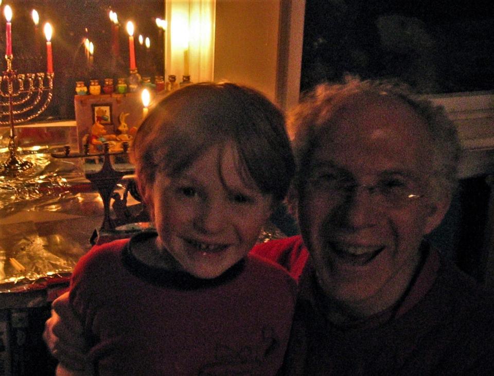 Shoshana Brown's husband Mark Elber, right, with their son Lev Elber, left, on Hanukkah in 2007.