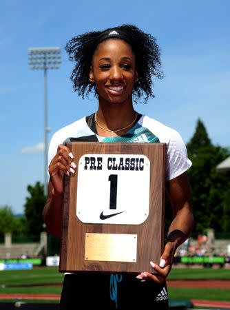 May 28, 2016; Eugene, OR, USA; Kendra Harrison (USA) poses with the Maria Mutola outstanding athlete award during the 42nd Prefontaine Classic at Hayward Field. Harrison won the women's 100m hurdles in an American record 12.24. Mandatory Credit: Kirby Lee-USA TODAY Sports