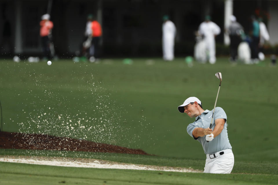 Rory McIlroy, of Northern Ireland, practices on the driving range at the Masters golf tournament Tuesday, April 9, 2019, in Augusta, Ga. (AP Photo/Matt Slocum)