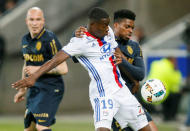 Football Soccer - Olympique Lyon v Monaco - French Ligue 1 - Stade de Lyon – Decines, France - 23/4/2017 Olympique Lyon's Jean-Philippe Mateta (C) in action against Monaco's Jemerson (R) REUTERS/Robert Pratta