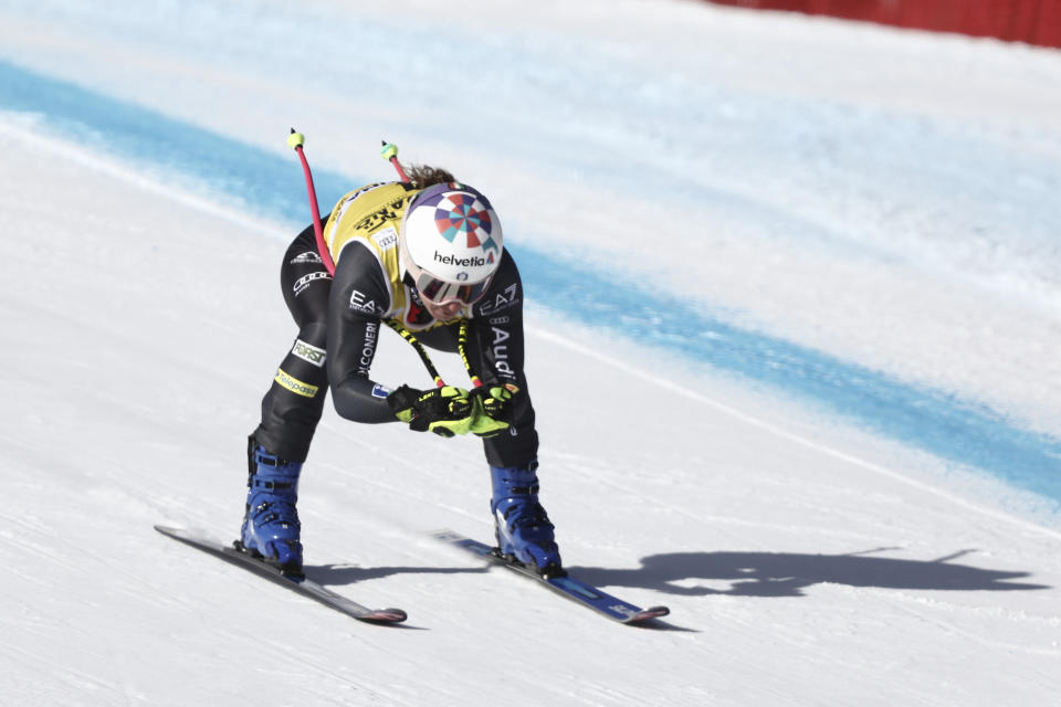 Italy's Marta Bassino speeds down the course during an alpine ski, women's World Cup super-G, in Cortina d'Ampezzo, Italy, Sunday, Jan. 22, 2023. (AP Photo/Gabriele Facciotti)