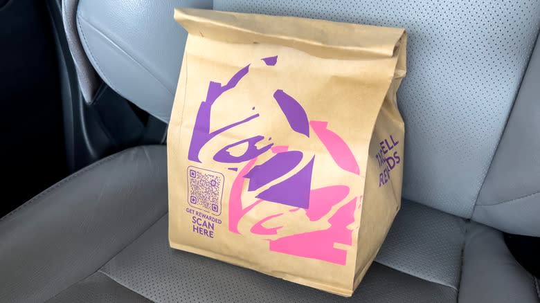 Taco Bell bag in car