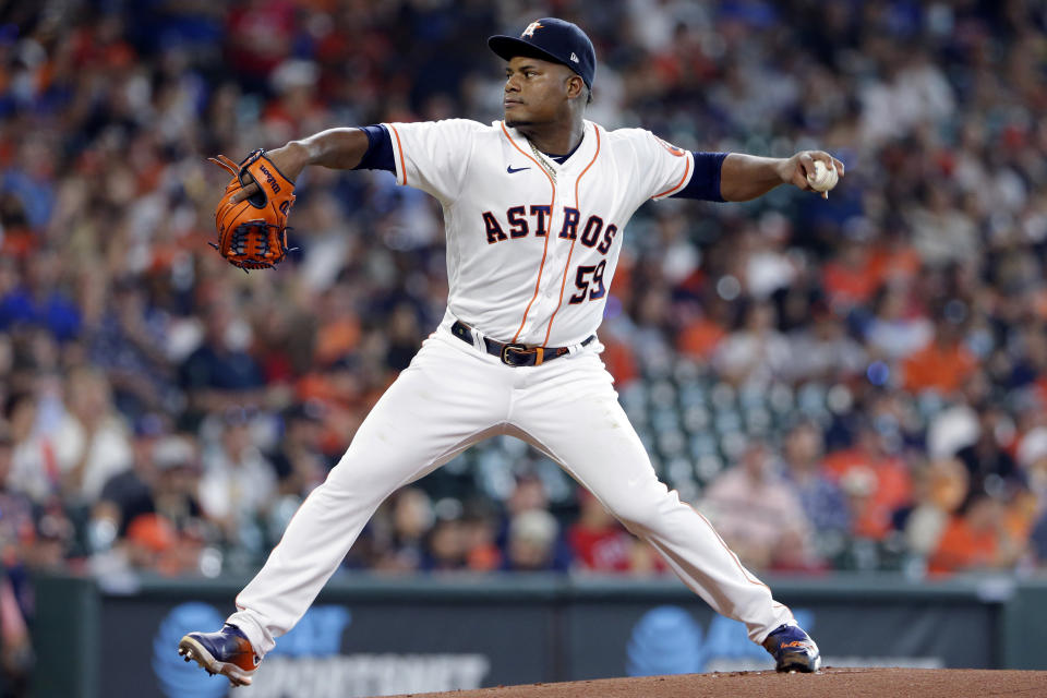 Houston Astros starting pitcher Framber Valdez throws to a Texas Rangers batter during the first inning of a baseball game Saturday, July 24, 2021, in Houston. (AP Photo/Michael Wyke)