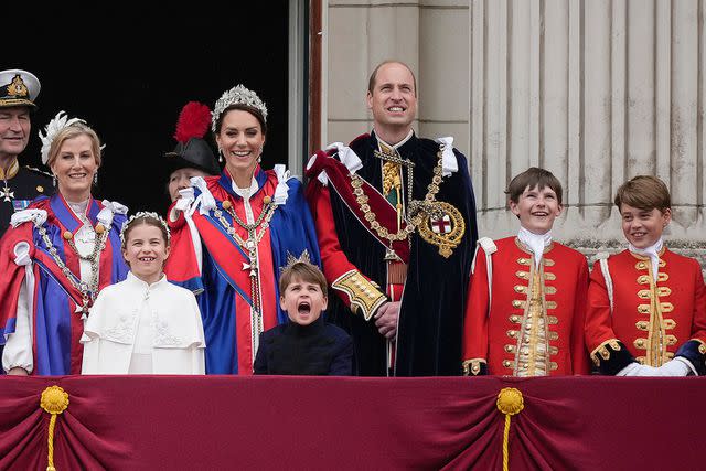 Christopher Furlong/Getty Vice Admiral Sir Timothy Laurence, Sophie, Duchess of Edinburgh, Princess Charlotte of Wales, Anne, Princess Royal, Catherine, Princess of Wales, Prince Louis of Wales, Prince William, Prince of Wales, Page of Honour Lord Oliver Cholmondeley and Prince George of Wales pose on the Buckingham Palace balcony on the May 6, 2023 coronation day.