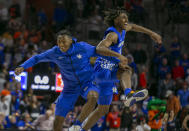 Kentucky players during the second half of an NCAA college basketball game against Florida, Saturday, March 7, 2020, in Gainesville, Fla. (AP Photo/Alan Youngblood)