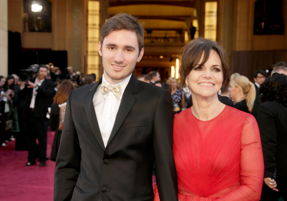 Sam Greisman (L) and Sally Field arrive at the Oscars in 2013. (Photo: Jeff Vespa via Getty Images)