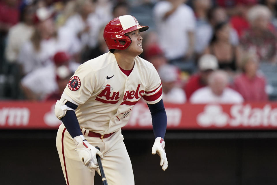 Los Angeles Angels' Shohei Ohtani watches his home run during the third inning of the team's baseball game against the Chicago White Sox on Tuesday, June 28, 2022, in Anaheim, Calif. (AP Photo/Jae C. Hong)