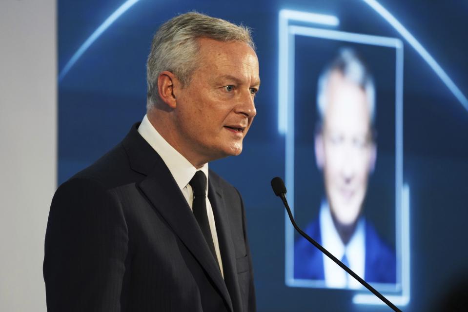 French Finance Minister Bruno Le Maire speaks at a conference in Abu Dhabi, United Arab Emirates, Monday, Jan. 30, 2023. Le Maire said Monday that pension reforms being pushed by French President Emmanuel Macron were necessary despite facing protests and growing opposition back home. (AP Photo/Jon Gambrell)