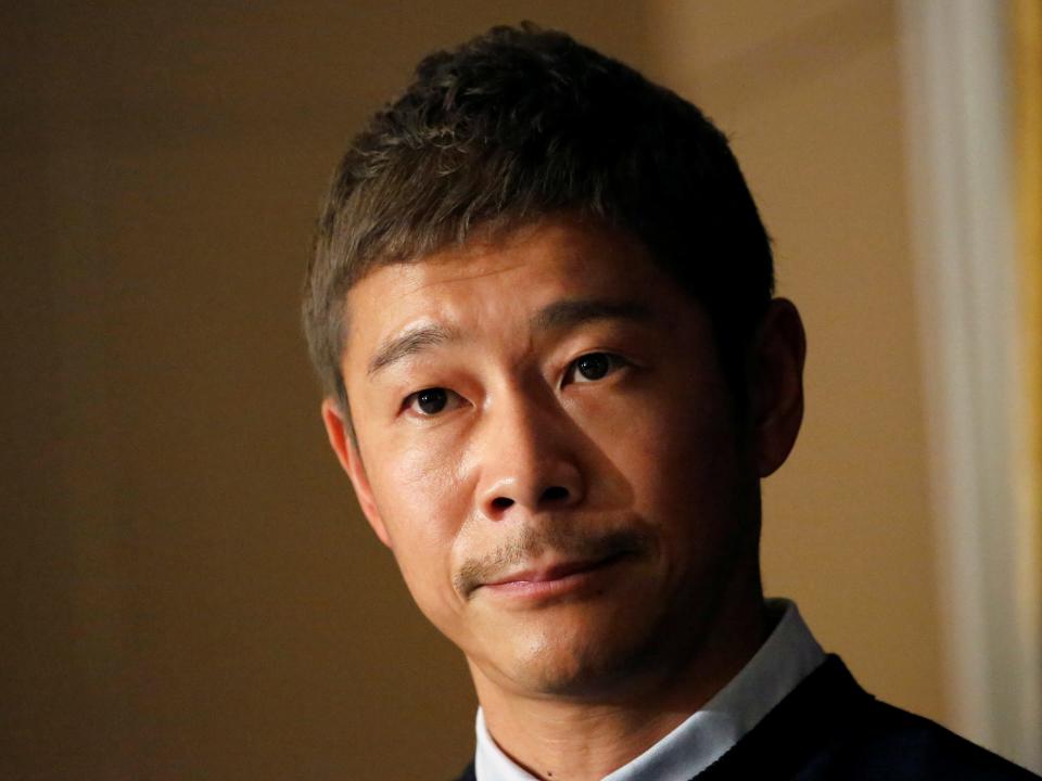 FILE PHOTO: Japanese billionaire Yusaku Maezawa, founder and chief executive of online fashion retailer Zozo, who has been chosen as the first private passenger by SpaceX, attends a news conference at the Foreign Correspondents' Club of Japan in Tokyo, Japan, October 9, 2018.   REUTERS/Toru Hanai