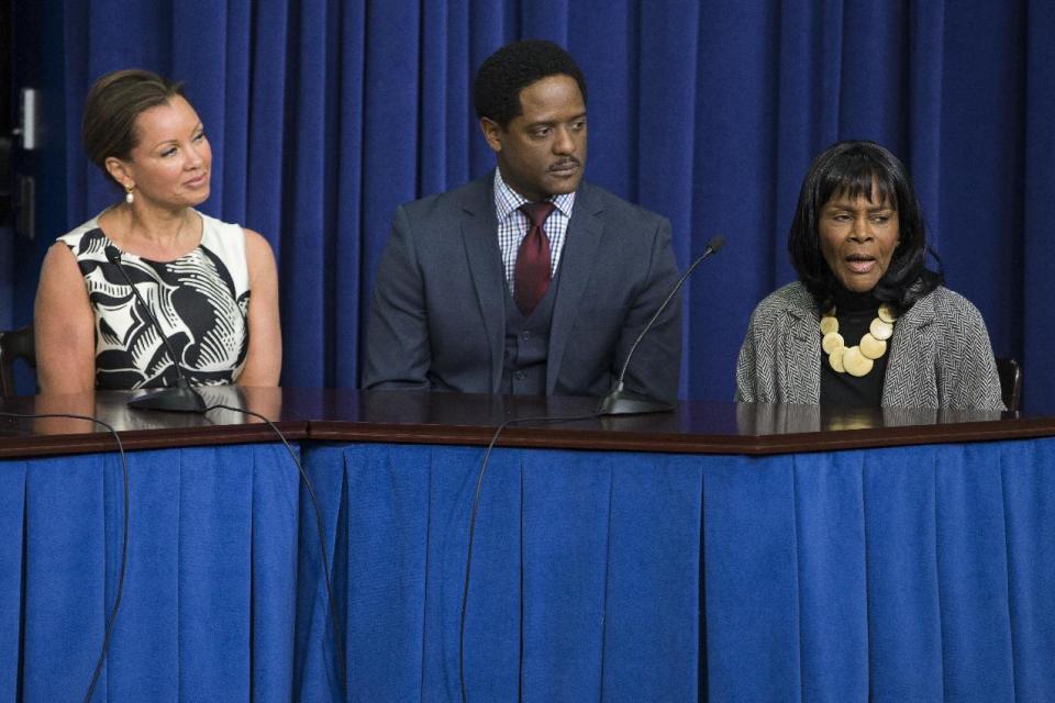 Actors Vanessa Williams, left, and Blair Underwood, center, look on as Cicely Tyson speaks during a roundtable discussion after a screening of the movie "The Trip to Bountiful" in the South Court Auditorium on the White House complex on Monday, Feb. 24, 2014, in Washington. (AP Photo/ Evan Vucci)