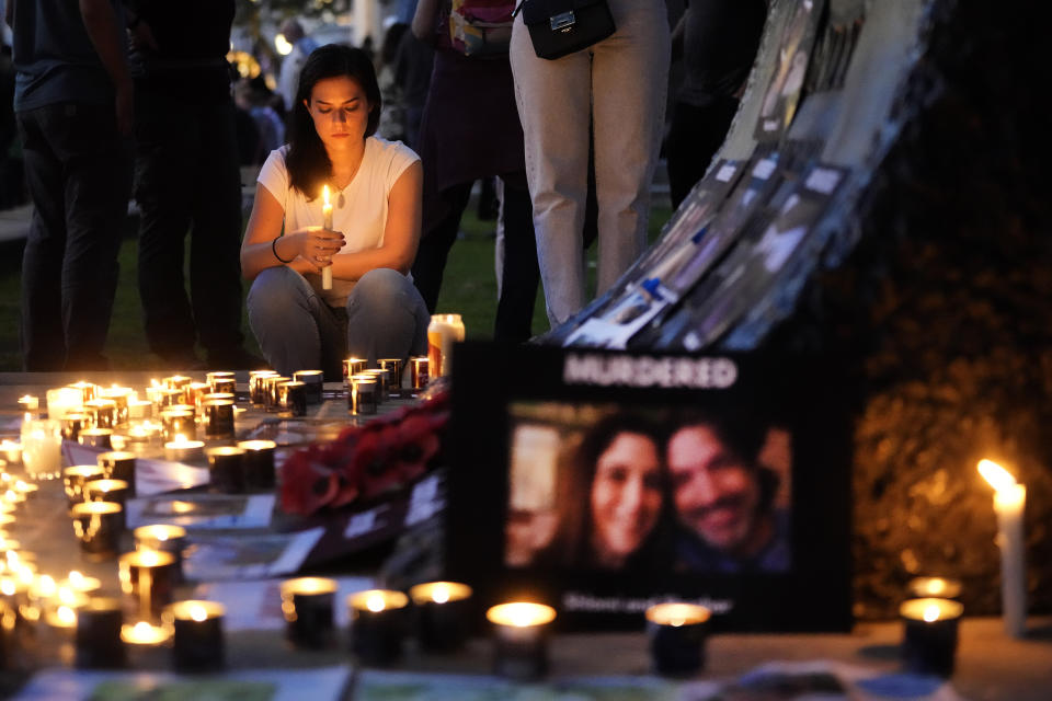 People light candles during the 'Jewish Community Vigil' for Israel in London, Monday, Oct. 9, 2023, two days after Hamas fighters launched a multi-front attack on Israel. (AP Photo/Kin Cheung, File)