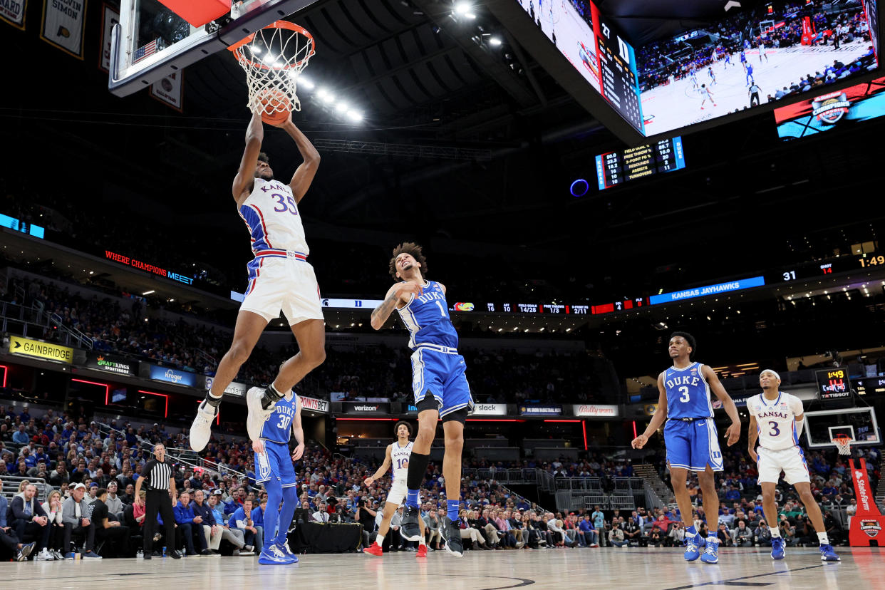 INDIANAPOLIS, INDIANA - NOVEMBER 15: Zuby Ejiofor #35 of the Kansas Jayhawks dunks the ball during the first half in the game against the Duke Blue Devils during the Champions Classic at Gainbridge Fieldhouse on November 15, 2022 in Indianapolis, Indiana. (Photo by Andy Lyons/Getty Images)