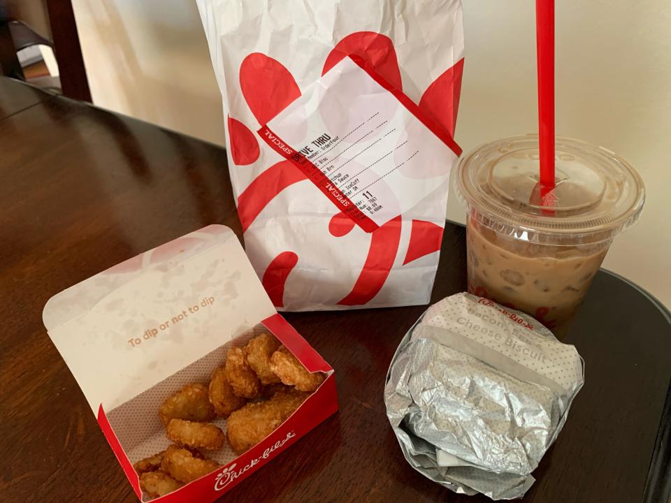 Chick-fil-a breakfast spread on wooden table