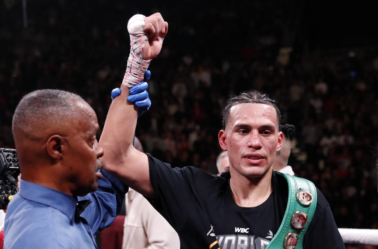 LAS VEGAS, NEVADA - MARCH 25: David Benavidez (R) poses with referee Kenny Bayless after defeating Caleb Plant in a WBC super middleweight fight at MGM Grand Garden Arena on March 25, 2023 in Las Vegas, Nevada. Benavidez retained his WBC interim super middleweight title by unanimous decision.  (Photo by Steve Marcus/Getty Images)