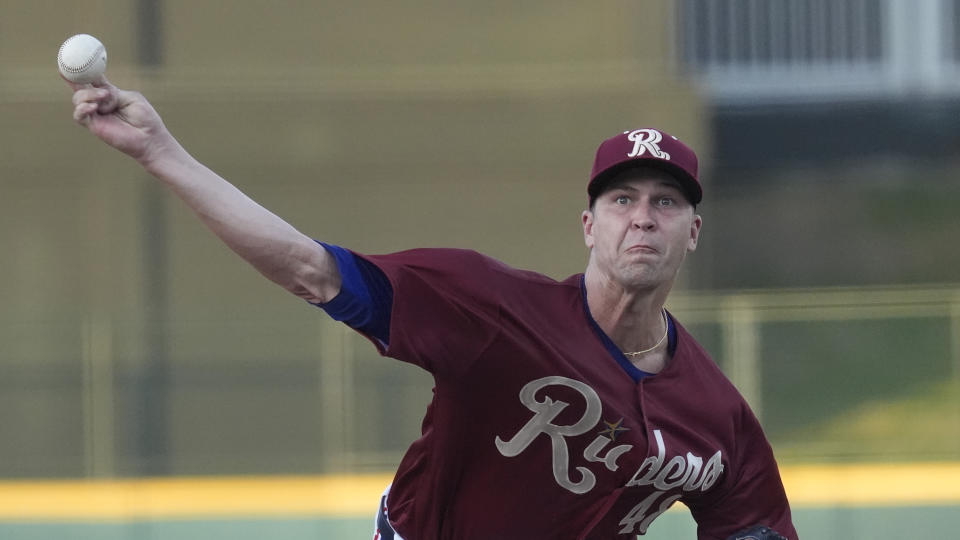 Texas Rangers pitcher Jacob deGrom throws during his rehab start for a Frisco Rough Riders baseball game in Frisco, Texas, Thursday, Aug. 22, 2024, (AP Photo/LM Otero)