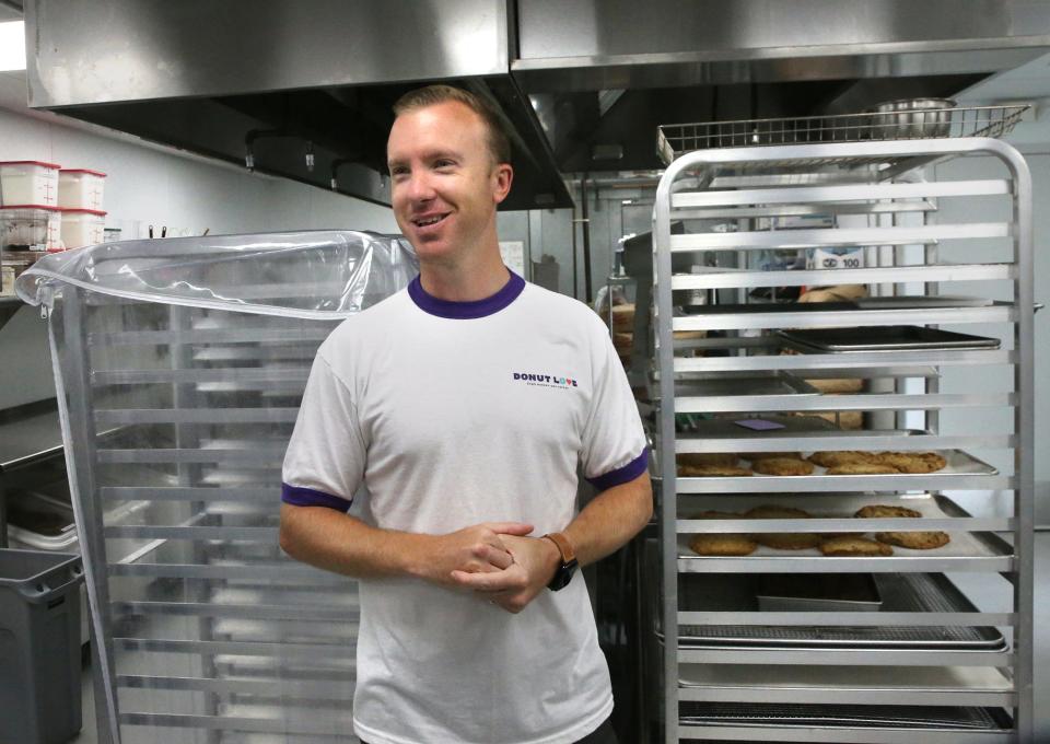 Tyler Goodwin of Donut Love stands in the newly remodeled kitchen area where food is created for both the new Exeter shop as well as the North Hampton one.