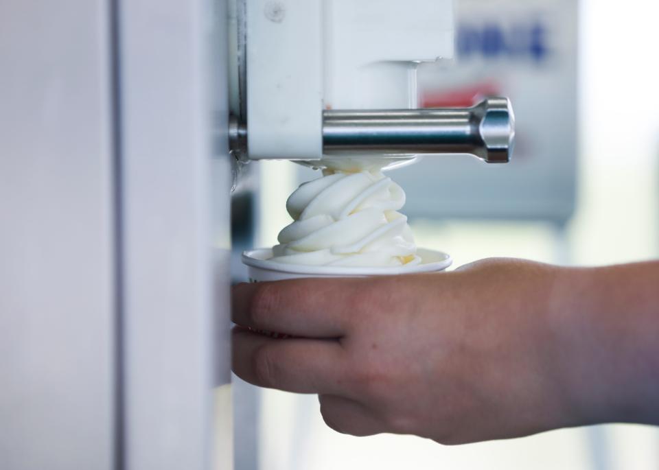 A cup of Pineapple Whip is dispensed from a machine on Wednesday, June 21, 2023.