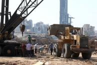 People work at the damaged site of Beirut port