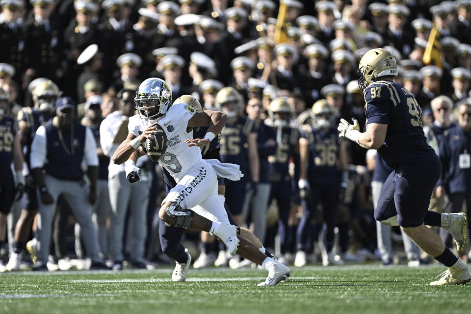 Air Force quarterback Zac Larrier (9) runs the ball during the second half of an NCAA college football game against Navy, Saturday, Oct. 21, 2023, in Annapolis, Md. (AP Photo/Terrance Williams)