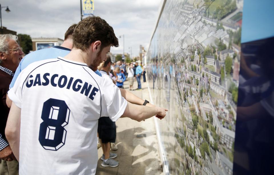 Fans look at plans for the new White Hart Lane