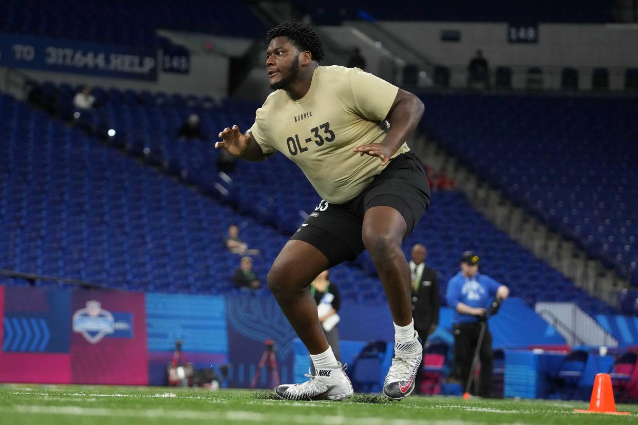 Mar 3, 2024; Indianapolis, IN, USA; Connecticut offensive lineman Christian Haynes (OL33) during the 2024 NFL Scouting Combine at Lucas Oil Stadium. Mandatory Credit: Kirby Lee-USA TODAY Sports