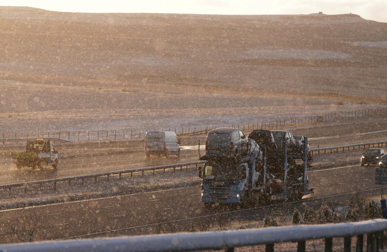 Stock image of vehicles travelling in snow