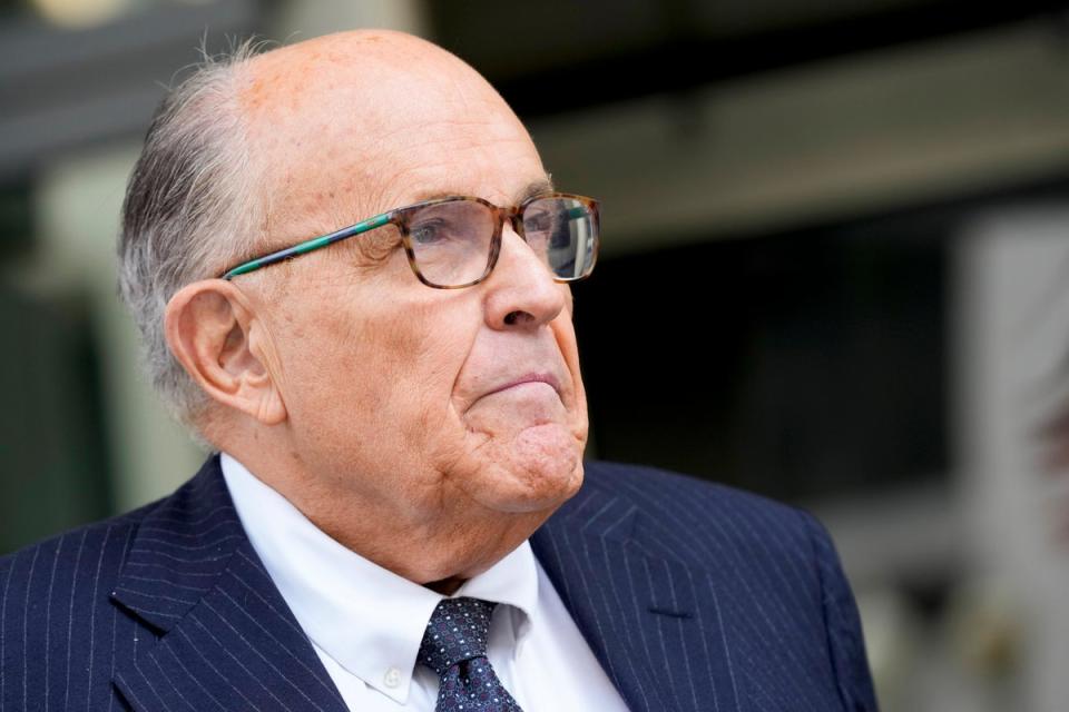 Rudy Giuliani is being sued for $10m in a sexual harassment lawsuit (AP)