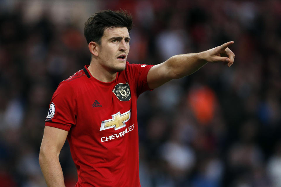 Manchester United's Harry Maguire gestures during the English Premier League soccer match between Wolverhampton Wanderers and Manchester United at the Molineux Stadium in Wolverhampton, England, Monday, Aug. 19, 2019. (AP Photo/Rui Vieira)