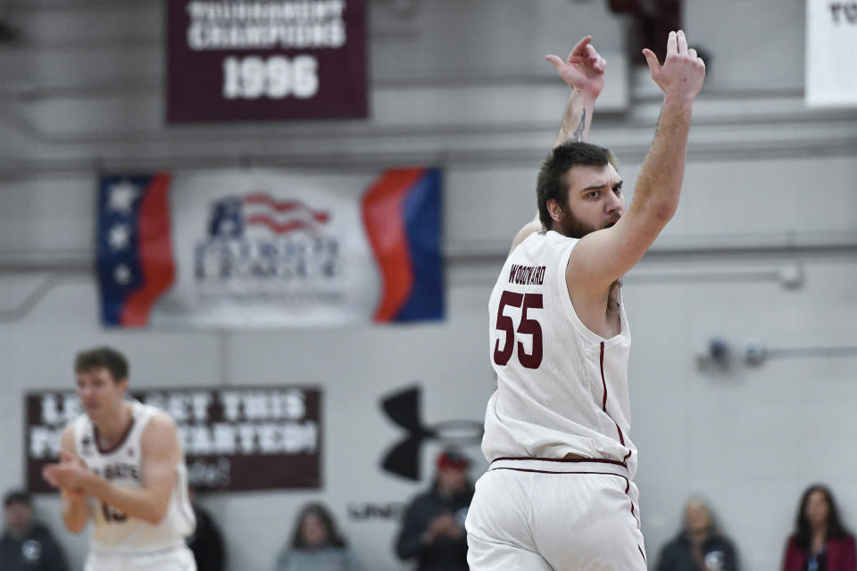 Colgate forward Jeff Woodward (55) reacts after scoring against Lafayette during the first half of an NCAA college basketball game for the Patriot League tournament championship in Hamilton, N.Y., Wednesday, March 8, 2023. (AP Photo/Adrian Kraus)