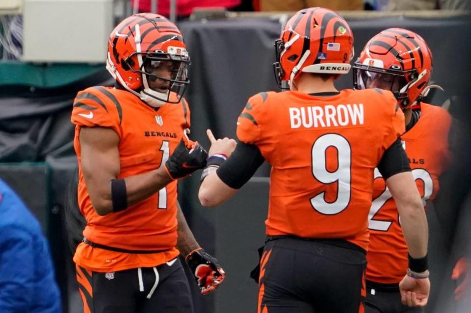 Quarterback Joe Burrow (9) and wide receiver Ja’Marr Chase are 6-0 in postseason games together playing at LSU and for Cincinnati. Their streak is headed for a huge test Sunday at Kansas City in the AFC championship.