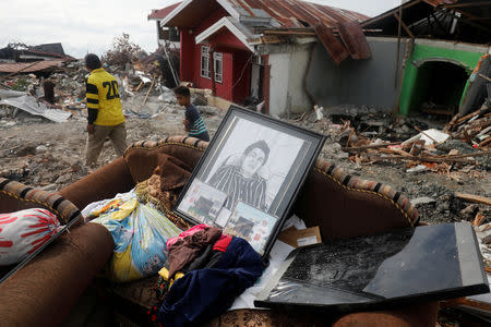 Recoverd personal items are pictured outside a home in the earthquake and liquefaction affected Balaroa neighbourhood in Palu, Central Sulawesi, Indonesia, October 11, 2018. REUTERS/Darren Whiteside