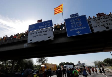 People take part in a protest march in Parets Del Valles