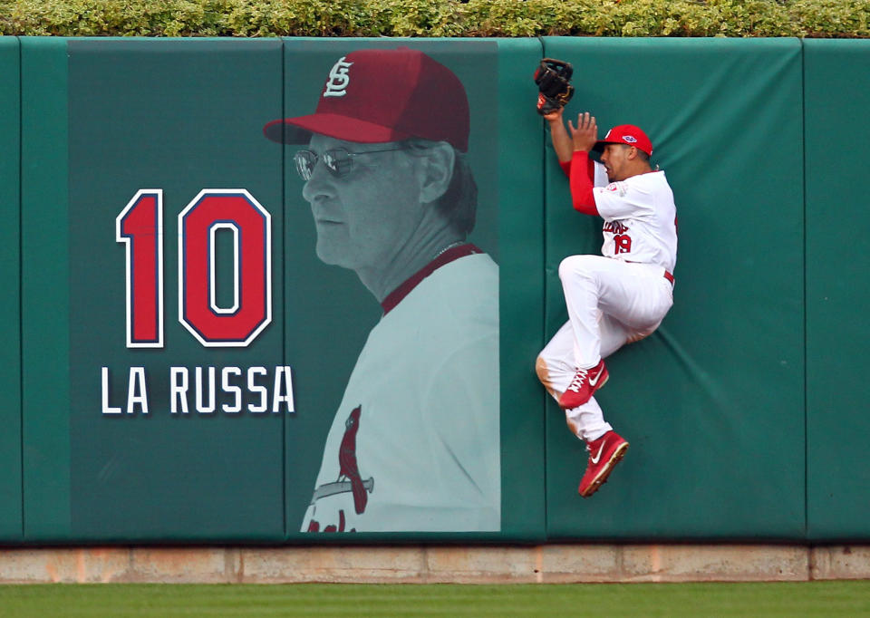 Jon Jay #19 of the St. Louis Cardinals makes a catch against the wall on a ball hit by Danny Espinosa #8 of the Washington Nationals in the sixth inning during Game Two of the National League Division Series at Busch Stadium on October 8, 2012 in St Louis, Missouri. (Photo by Dilip Vishwanat/Getty Images)