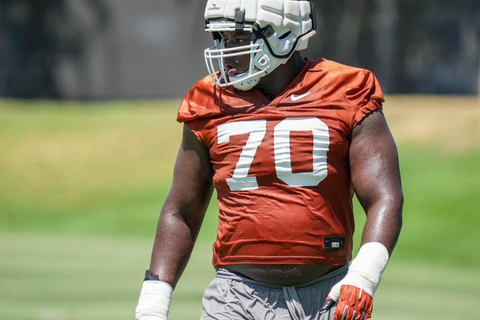 Texas Longhorn offensive linemen Christian Jones (70) runs through drills during their second day of preseason practice at the Denius Fields on Thursday, Aug. 3, 2023.