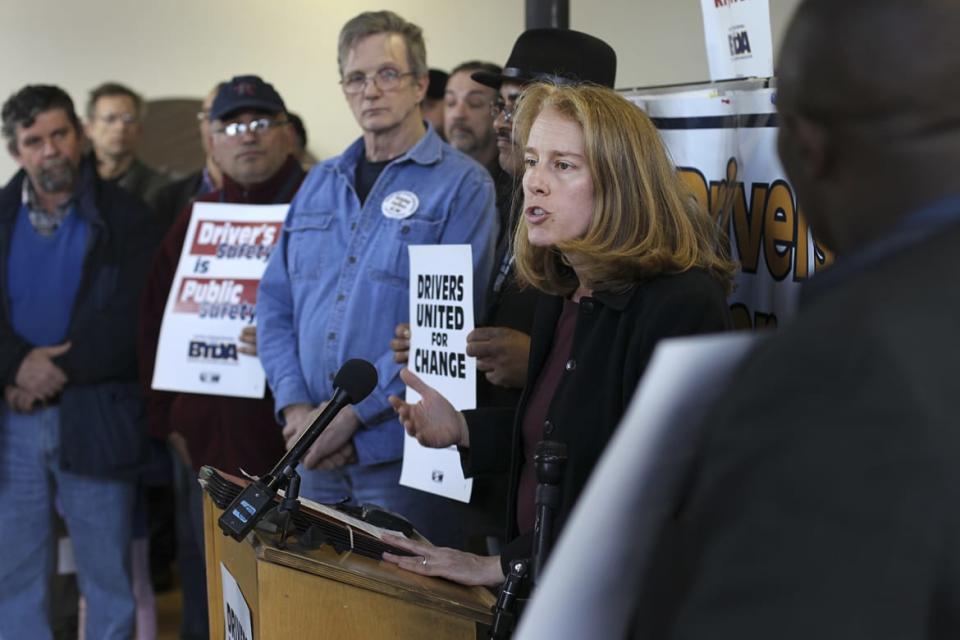 <div class="inline-image__caption"><p>Shannon Liss-Riordan speaking to reporters about the United Steelworker's Boston Taxi Driver Association.</p></div> <div class="inline-image__credit">Boston Globe/Getty</div>