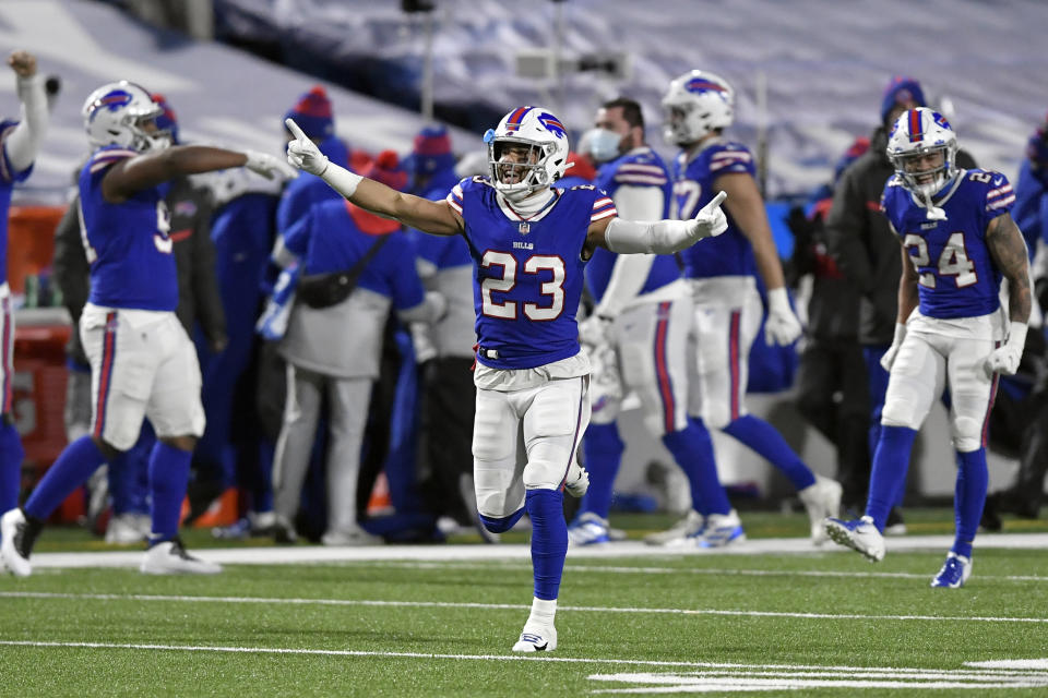 Buffalo Bills' Micah Hyde (23) celebrates with teammates after an NFL divisional round football game against the Baltimore Ravens Saturday, Jan. 16, 2021, in Orchard Park, N.Y. The Bills won 17-3. (AP Photo/Adrian Kraus)