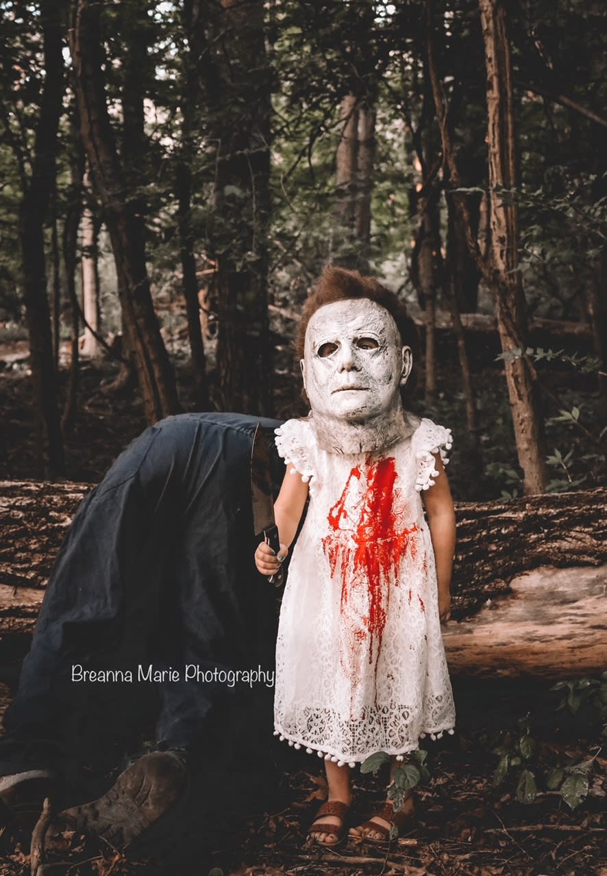When Maci's tea party ends, the 4-year-old is covered in Myers' blood and has stolen his iconic mask. (Breanna Marie Photography)