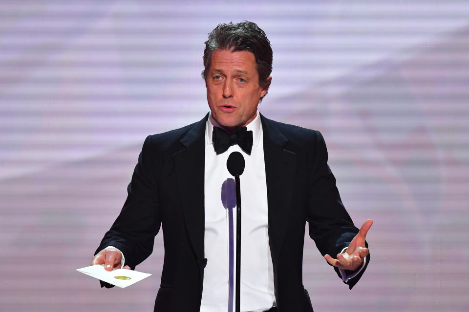 Actor Hugh Grant speaks onstage during the 25th Annual Screen Actors Guild Awards show at the Shrine Auditorium in Los Angeles on January 27, 2019. (Photo by Frederic J. BROWN / AFP)        (Photo credit should read FREDERIC J. BROWN/AFP/Getty Images)
