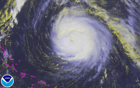 Hurricane Gonzalo is seen in an image taken over the Atlantic Ocean by NOAA's GOES satellite at 11:45EDT (15:45GMT) October 16, 2014. REUTERS/NASA/NOAA GOES Project/Handout
