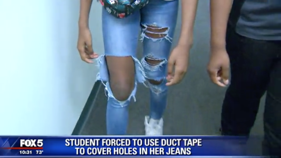 A middle schooler gets duct tape put on her legs to cover up a dress code violation. (Photo: Fox 5)