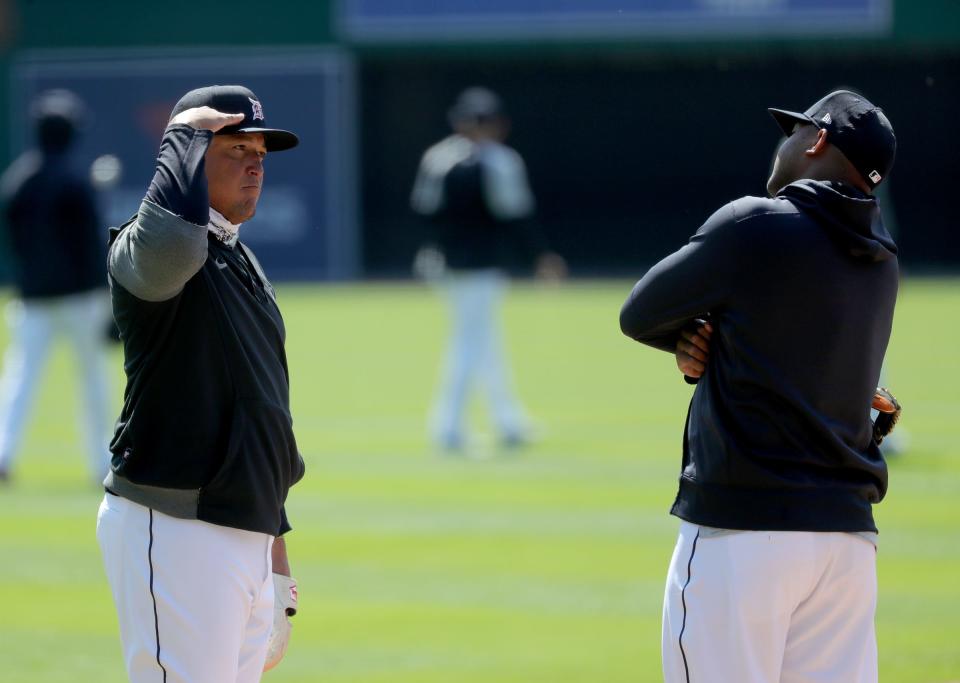 Tigers first baseman Miguel Cabrera salutes second baseman Jonathan Schoop on the field during practice on Wednesday, March 31, 2021, at Comerica Park.