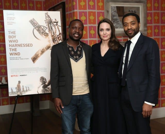 Book author William Kamkwamba, host Angelina Jolie and director Chiwetel Ejiofor attend 'The Boy Who Harnessed The Wind' Special Screening at Crosby Street Hotel on February 25, 2019 in New York City