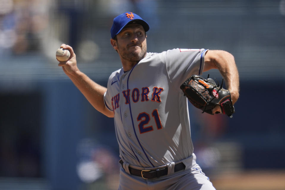 New York Mets starting pitcher Max Scherzer (21) throws during the first inning of a baseball game against the Los Angeles Dodgers in Los Angeles, Wednesday, April 19, 2023. (AP Photo/Ashley Landis)