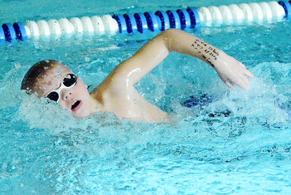 Kegan Kasparek of the Watertown Area Swim Club swims the mixed 8-and-under 25-yard freestyle over the weekend in the Optimist High Point Swim Meet at the Prairie Lakes Wellness Center.