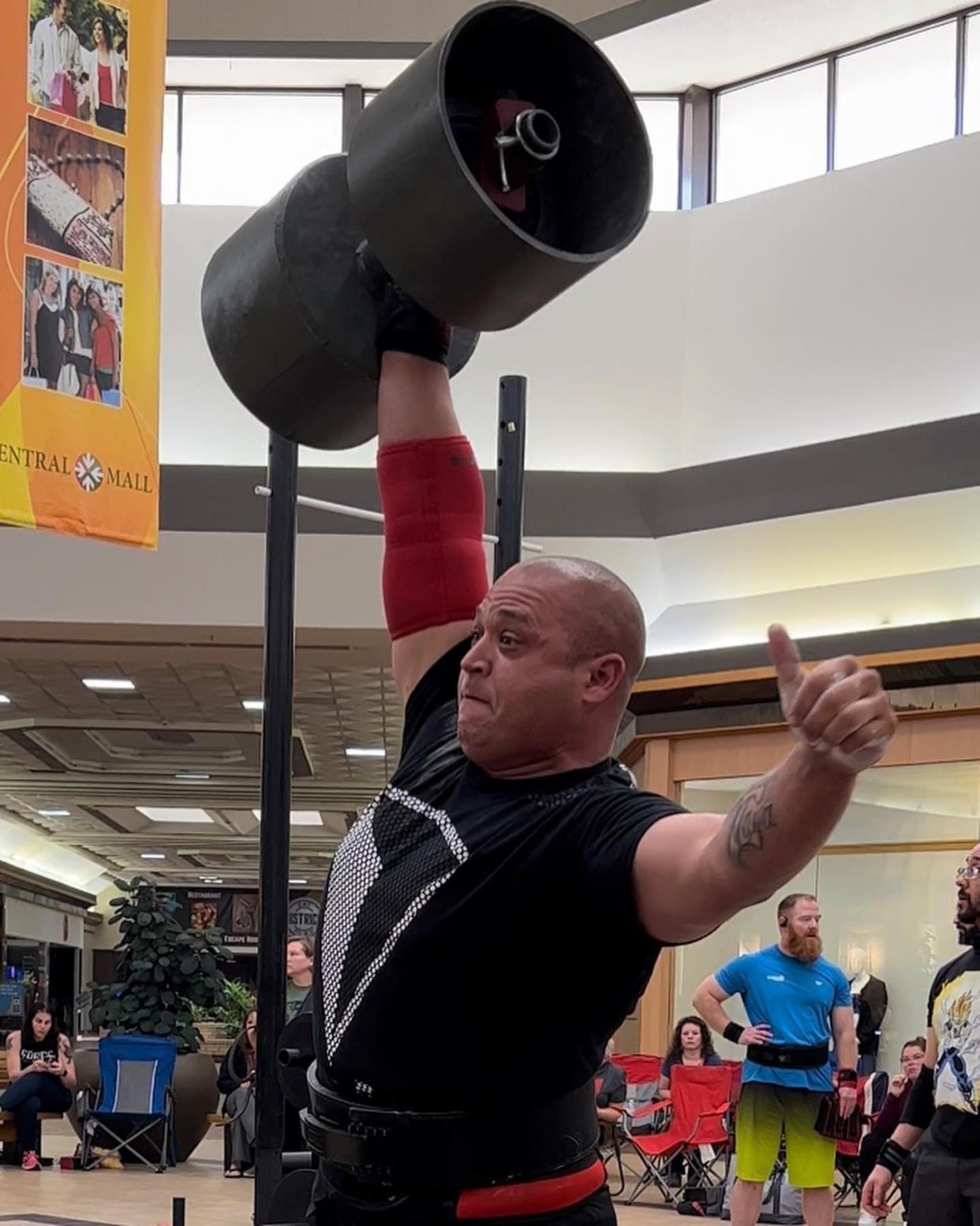 Salina firefighter Chris Rios lifts a weight during a strongman competition at Central Mall in Salina. Rios traveled to and competed in the 2023 World's Strongest Firefighter Contest at the Arnold Sports Festival that took place at the beginning of March in Columbus, Ohio, where he placed 29th overall.