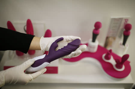 Choi Jung-yoon shows a product at her sex toy shop in Seoul, South Korea, December 16, 2015. REUTERS/Kim Hong-Ji